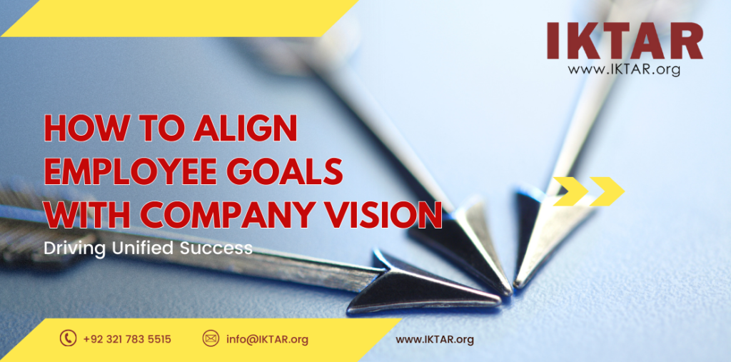 Manager guiding employees in a goal-setting session, representing alignment between employee goals and company vision